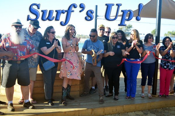 Nearly 200 braved high temperatures to welcome Surf Ranch to City of Lemoore Surf Ranch Manager Sam Ramirez gets the royal welcome from Lemoore Chamber of Commerce officials and local dignitaries Tuesday at the local man-made surfing facility.